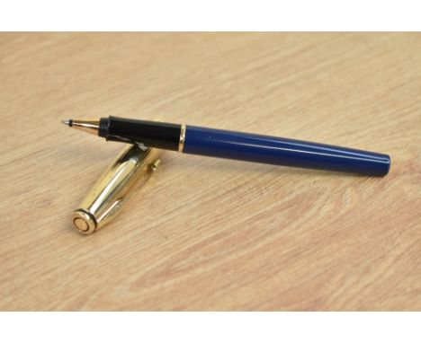 A Parker 75 Insignia rollerball pen in in blue with custon gold plated cap