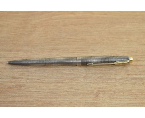 A Parker 75 Cicele ballpoint pen in sterling silver with gold trim