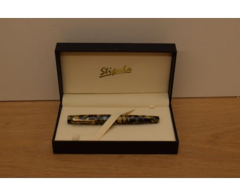 A boxed Stipula Isola Stromboli piston fill limited edition (31/40) fountain pen in red and pink with green veining having a 