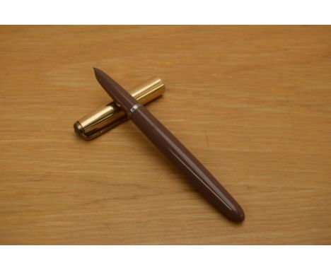 A Parker 51 MKII aerometric fill fountain pen in cocoa with rolled gold cap.