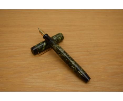 A Parker Victory button fill fountain pen in green lined pattern with bandless cap having a Parker 14k Pen N nib