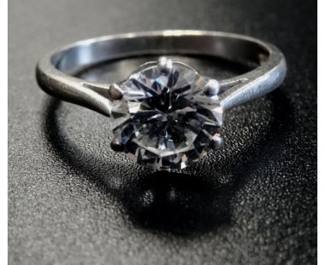 DIAMOND SOLITAIRE RINGby Philip Antrobus Ltd. the round brilliant cut diamond weighing 1.35cts, on platinum shank, ring size 
