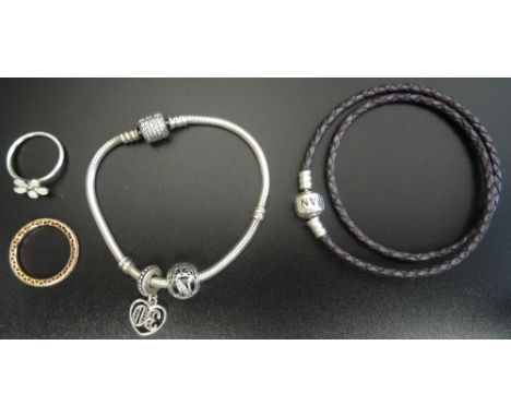 SELECTION OF PANDORA JEWELLERYcomprising a Moments silver charm bracelet with two charms; a double braided charm bracelet; a 