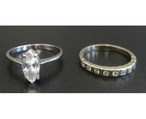 DIAMOND HALF ETERNITY RING in fourteen carat gold, ring size K; together with a marquise cut CZ solitaire ring on fourteen ca