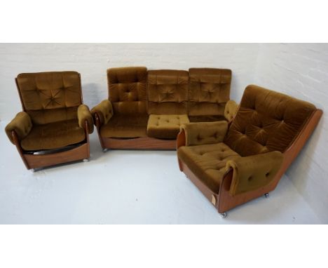 RETRO G PLAN TEAK THREE PIECE SUITEcomprising a sofa and two armchairs, each with shaped ends with green velvet armrests and 