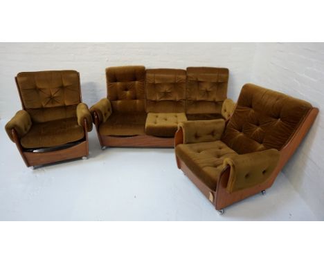 RETRO G PLAN TEAK THREE PIECE SUITEcomprising a sofa and two armchairs, each with shaped ends with green velvet armrests and 