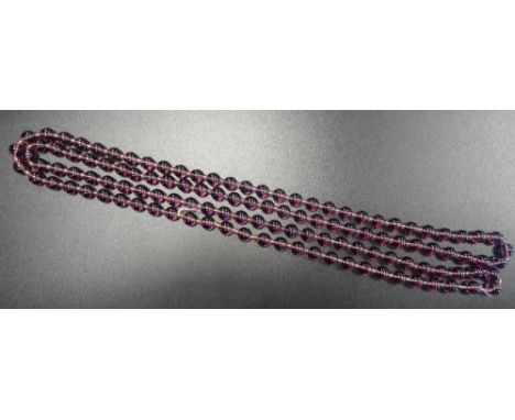 VINTAGE AMETHYST BEAD NECKLACEthread strung, approximately 59.2cm long
