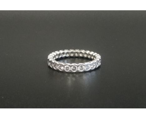 DIAMOND ETERNITY RINGin platinum, the twenty-seven diamonds totalling approximately 1ct, ring size L-M