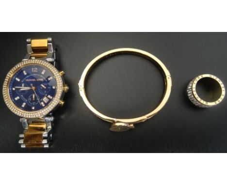 SELECTION OF MICHAEL KORS JEWELLERYcomprising a ladies watch model number MK-6141; a pave set rose gold tone hinged bangle, w