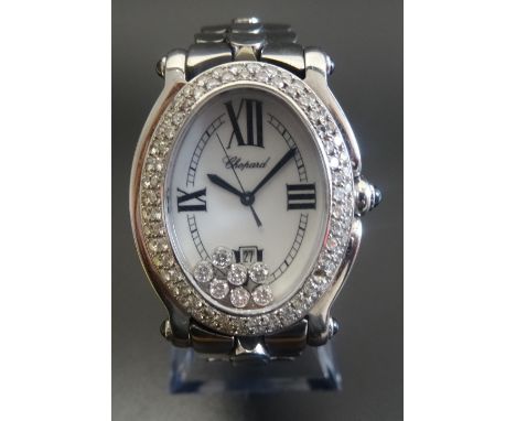 LADIES CHOPARD HAPPY SPORT WRISTWATCHmodel number 8937, the white dial with Roman numerals at III, VI, IX, and XII, with date