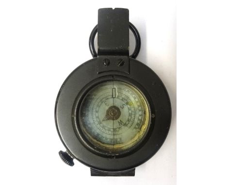 WWII BRITISH MKIII MILITARY COMPASSmarked 'T.G.Co.Ltd. London No.B168839', with War Department Arrow and dated 1942, with mak