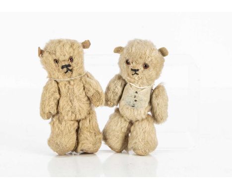 Two 1930s Chad Valley Father Teddy Bears,  with orange and black glass eyes, black stitched nose and mouths, felt ears, stitc