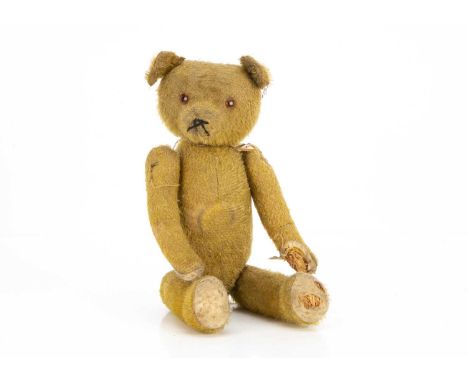 Richborough - a 1930s German Teddy Bear, with golden mohair, slotted in ear, orange and black glass eyes, black stitched nose