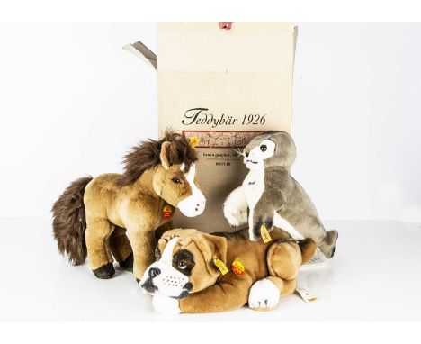 Three Steiff yellow tag soft toy animals,  comprising of Rico the horse, Bernie the Boxer dog and Robby Seal, with a Teddybar