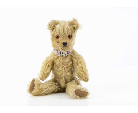 Chessetts-Wood - a British 1920-30s Teddy Bear, possibly Teddy Toy Company, with blonde mohair, orange and black glass eyes, 