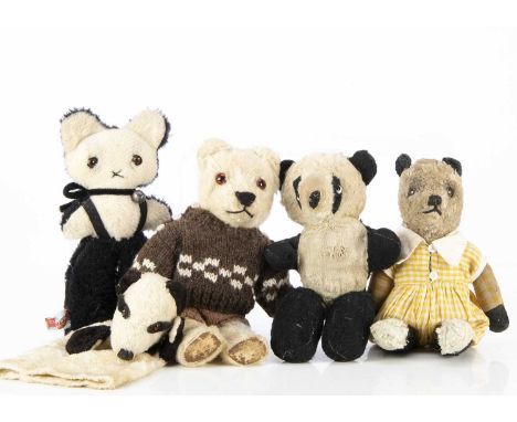 A post-war Teddy Bear and pandas, a Tara Toys teddy bear with blonde mohair, orange and black glass eyes, black stitched nose