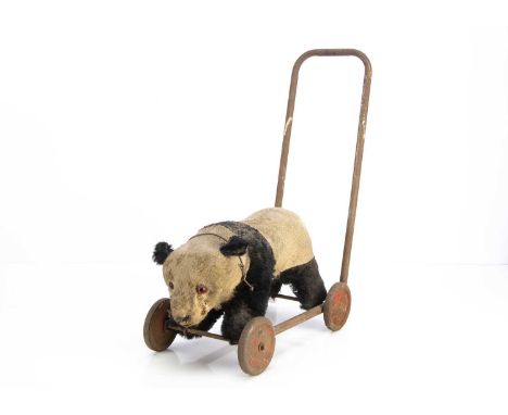 Ming -  a British panda on wheels 1950's,  with orange and black glass eyes, black stitched nose on a tubular metal frame --1