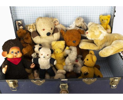 A selection of soft toys,  including a British cinnamon mohair spaniel 1930s; two German post-war reclining lions; Chad Valle