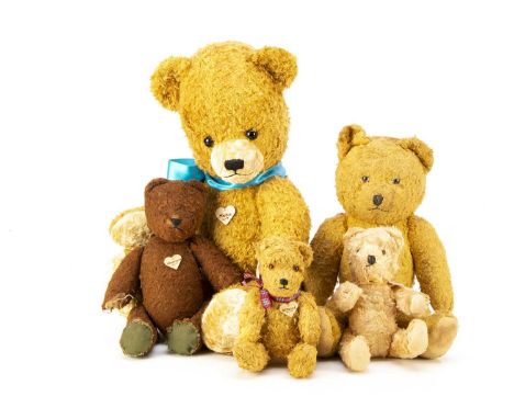 Five post-war Eastern European cotton plush Teddy Bears, the largest with velvet muzzle and velvet pads -- 19in. (48cm.) high