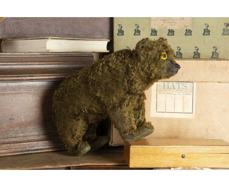 A British brown mohair Bear on all fours 1920s,  probably Farnell, black stitched nose and mouth, humped back, tail and stand