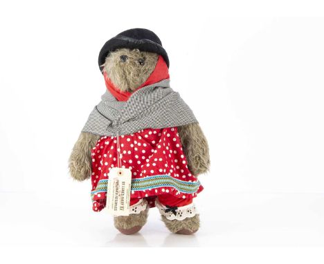 A Gabrielle Designs Aunt Lucy, with rare red clothes, paper tag, 'Aunt Lucy c/o The Home for Retired Bears Lima Peru', label 