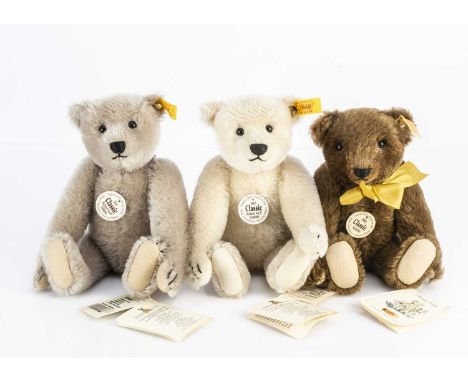 Three Steiff yellow taggd Teddy Bears, two Classic 1905 Richard Steiff Replicas, with white and grey mohair and a Classic 190