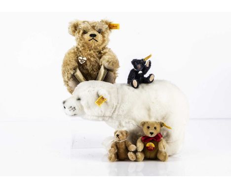 A Danbury Mint The Steiff Story, limited edition Teddy Bear, golden mohair, yellow tag, with reading glasses and miniature St