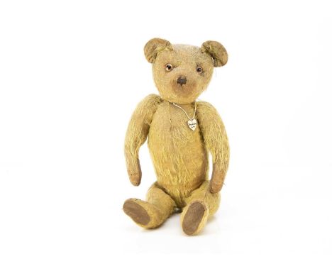 Ting-a-Ling - a 1915-20 British Teddy Bear, with blonde mohair, clear and black glass eyes with remains of orange painted bac
