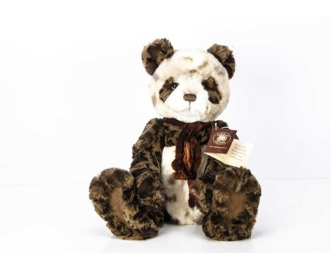 A Charlie Bears Elpa Panda Bear, from the Secret Collections, with dark and light brown leopard print plush to ears, eyes, sh