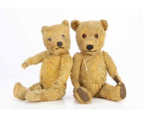 A 1930's Chiltern-type Teddy Bear,  with golden mohair, clear and black glass eyes with remains if brown painted backs, black