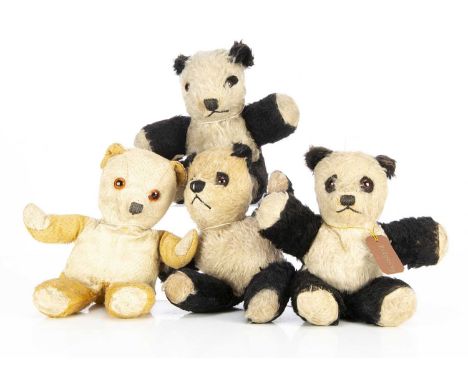 Three post-war Chiltern  unjointed Pandas,  two with inoperative squeakers, one with label to foot and a golden unjointed Pan