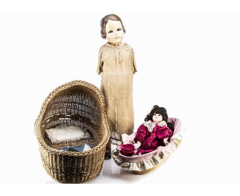 A composition shop window child mannequin, with moulded bobbed hair and glass eyes --38in. (97cm.) high (broken around neck, 