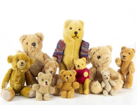 A group of small Teddy Bears, comprising a 1930 German cub, golden mohair, clear and black glass eyes with brown painted back