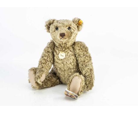 A Steiff yellow tagged classic  Teddy Bear, with card tag --16in (40cm.) high