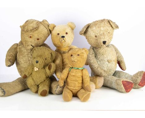 Five post-war Teddy Bears,  including a large golden mohair, with pointed muzzle, orange and black glass eyes, swivel head an