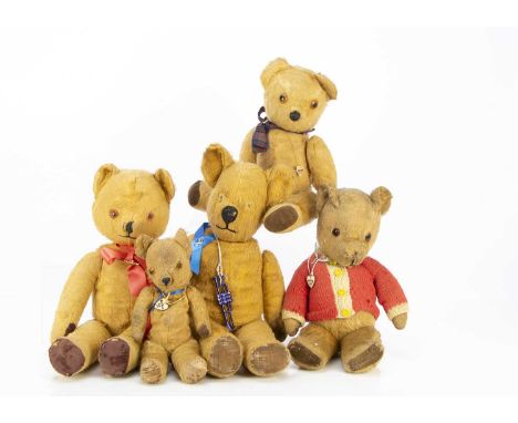 Five Pedigree post-war Teddy Bears, three with orange and black plastic eyes, one with glass, one with felt nose, another wit