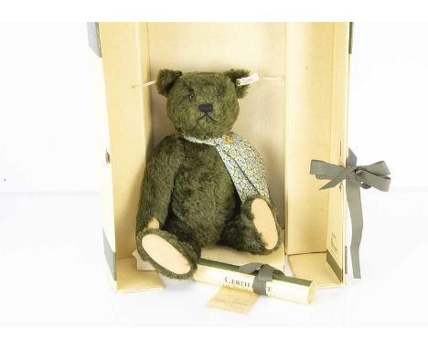 A Steiff limited edition Harrods musical Centenary Teddy Bear, 836 of 2000, for the year 1995, plays "The Anniversary Waltz",