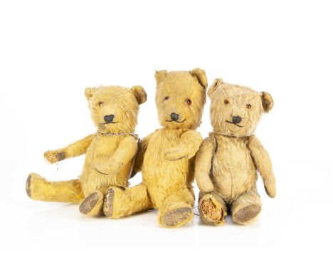 Three Post-war Chiltern Teddy Bears, one with blonde mohair, two with golden mohair, all with orange and black glass eyes, sw
