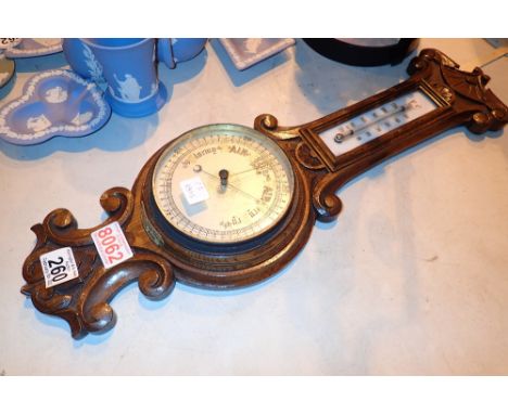 Early 20thC oak barometer made by Jolley of Wigan 