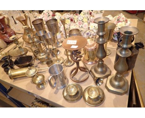 Shelf of brassware to include a blow lamp 