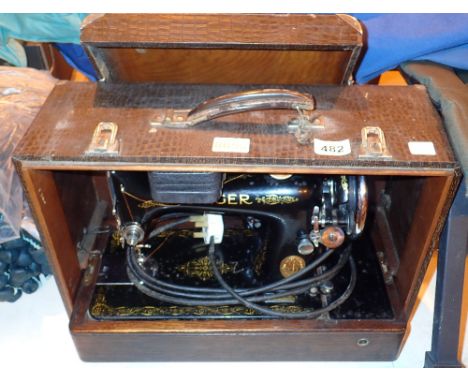 Cased electric Singer sewing machine EC141893 CONDITION REPORT: All electrical items in this lot have been PAT tested for saf
