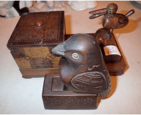 Wooden bird cigarette dispenser with further carved item