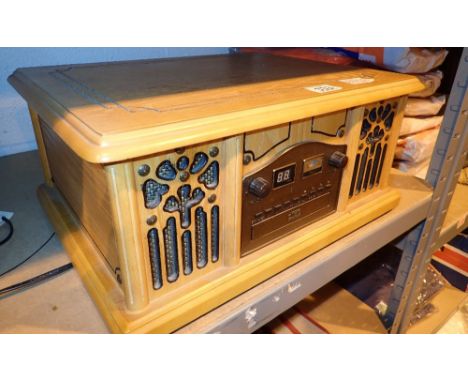 Retro style record CD and tape deck in a wooden case CONDITION REPORT: All electrical items in this lot have been PAT tested 