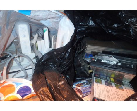Nintendo Wii games console with games and cables etc and a PS2 games console and games 