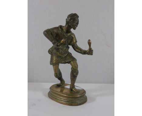Cast bronze figure of a man approx. 9" tall
