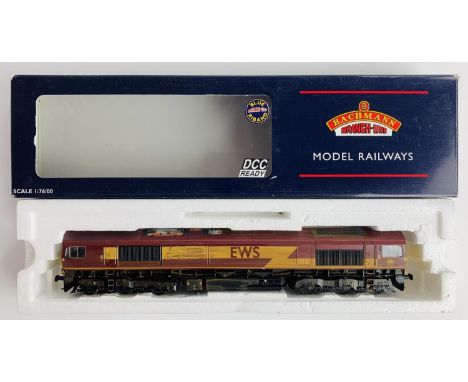 Bachmann Class 66 EWS - Fitted with P4 Wheel Sets - Poor Body - Boxed. P&amp;P Group 2 (£18+VAT for the first lot and £2+VAT 