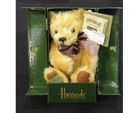 Coffee bean teddy bear, extremely soft, Merrythought bear with neck bow. Limited edition of 500 made for Harrods in a wardrob