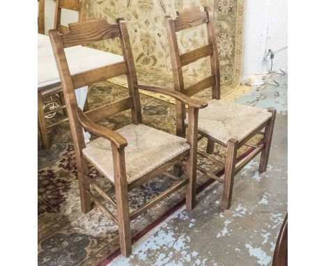 COUNTRY DINING CHAIRS, from J & IL Brown, a set of ten, oak ladder backs with rush seats, 53cm x 105cm H. (10)