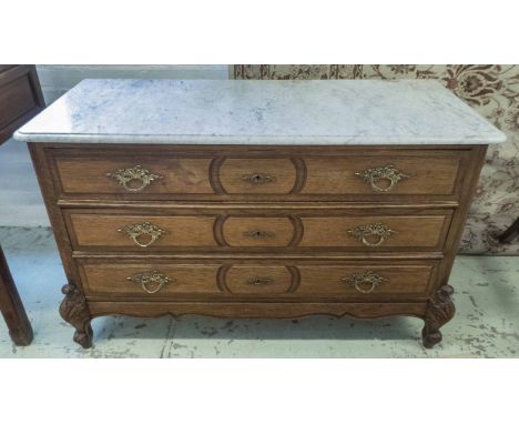 COMMODE, late 19th century French oak with a marble top over three drawers on carved cabriole supports, 120cm x 50cm x 77cm H