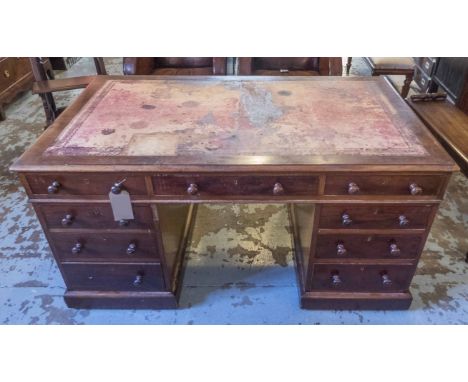 MAPLE & CO. PARTNER'S DESK, Victorian mahogany, with nine drawers opposed by three frieze drawers and panel cupboard doors to